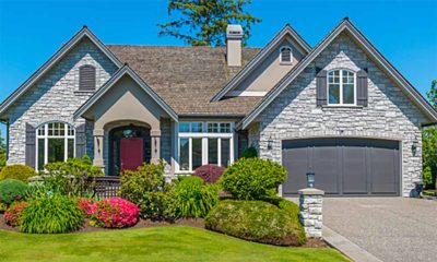 Residential home exterior associated with heating and cooling maintenance specials