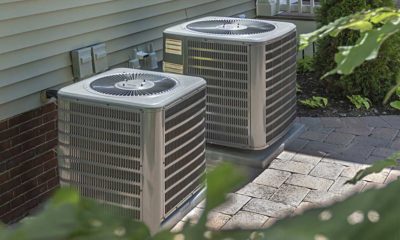 Outdoor HVAC replacement equipment installed beside a home